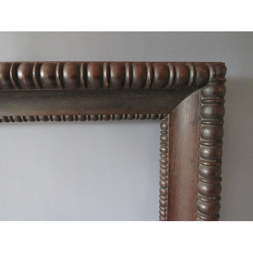 96 - A 19TH CENTURY DECORATIVE CARVED OAK FRAME, frame W 9 cm, rebate 54 x 37 cm