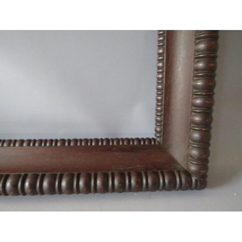 96 - A 19TH CENTURY DECORATIVE CARVED OAK FRAME, frame W 9 cm, rebate 54 x 37 cm