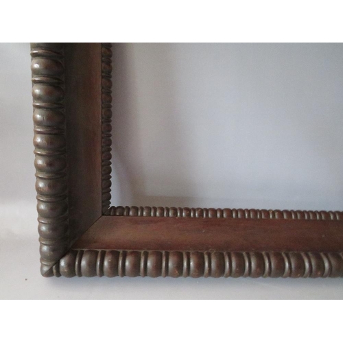 96 - A 19TH CENTURY DECORATIVE CARVED OAK FRAME, frame W 9 cm, rebate 54 x 37 cm