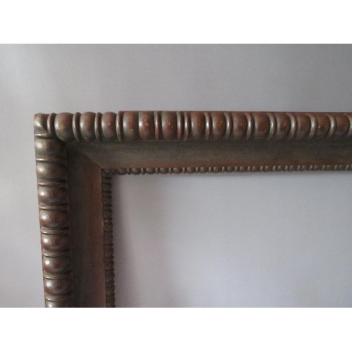 96 - A 19TH CENTURY DECORATIVE CARVED OAK FRAME, frame W 9 cm, rebate 54 x 37 cm