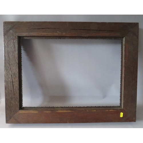 96 - A 19TH CENTURY DECORATIVE CARVED OAK FRAME, frame W 9 cm, rebate 54 x 37 cm
