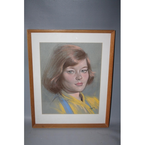 23 - WY?? (XX). A head and shoulder portrait study of a young woman, signed lower left, pastel on paper, ... 
