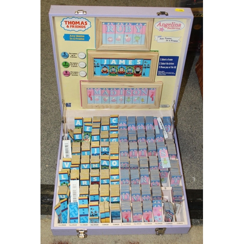 125 - A BOX OF ASSORTED COLLECTABLES TO INCLUDE A VINTAGE TELEPHONE, METAL DETECTOR, CASE OF CHILDRENS DOO... 