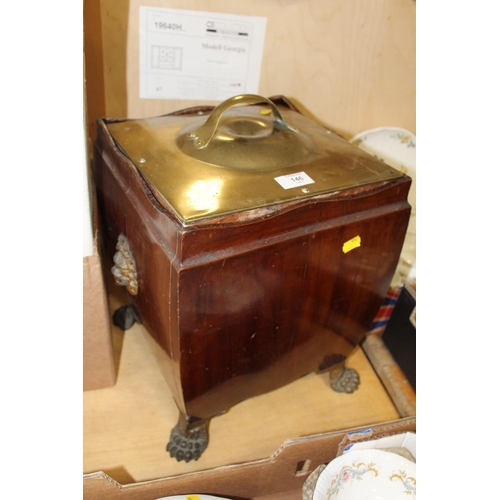 146 - A BRASS LIDDED MAHOGANY COAL BOX RAISED ON PAW FEET OVERALL HEIGHT - 44CM