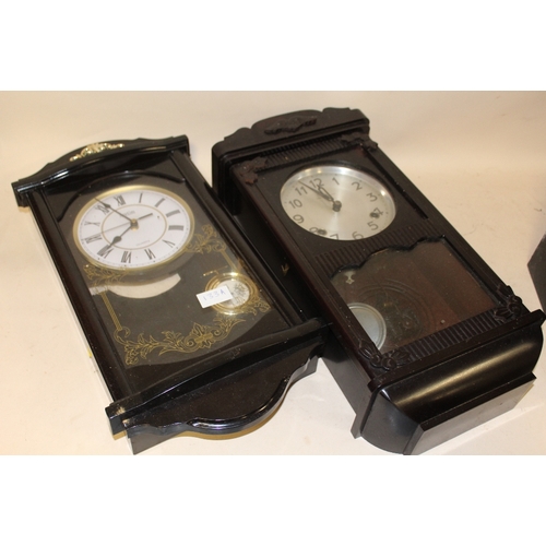 133A - TWO WALL CLOCKS, TO INCLUDE A PLASTIC EXAMPLE