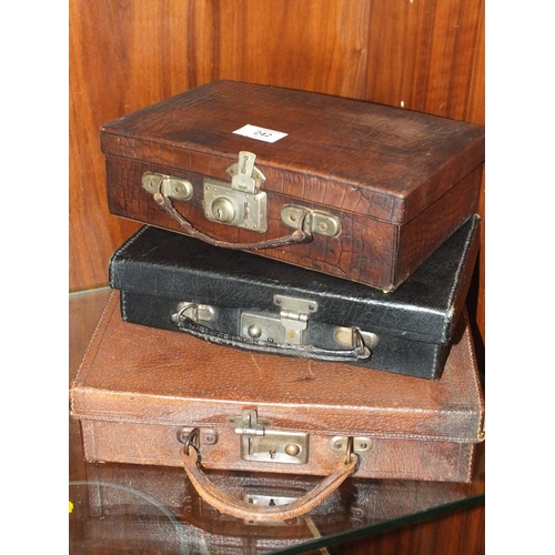 242 - THREE SMALL VINTAGE CASES