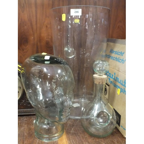 246 - AN UNUSUAL GLASS MODEL OF A HEAD, LARGE GLASS VASE AND A DECANTER (3)