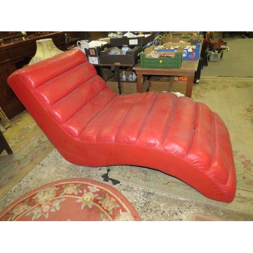 734 - A MODERN RED SHAPED CHAISE S/D AND MARKED - IN NEED OF A CLEAN