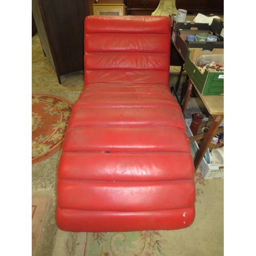 734 - A MODERN RED SHAPED CHAISE S/D AND MARKED - IN NEED OF A CLEAN