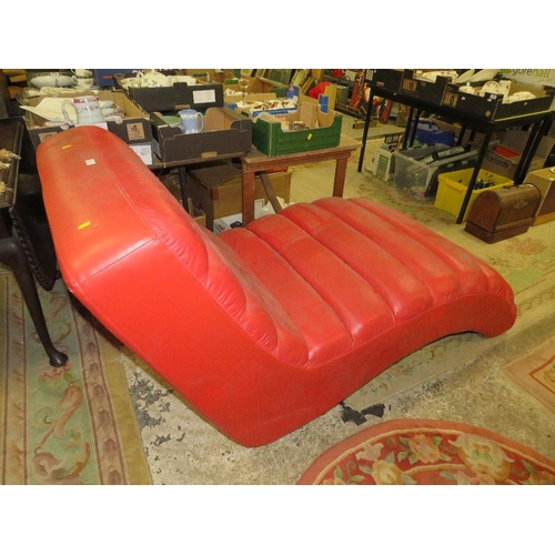 734 - A MODERN RED SHAPED CHAISE S/D AND MARKED - IN NEED OF A CLEAN