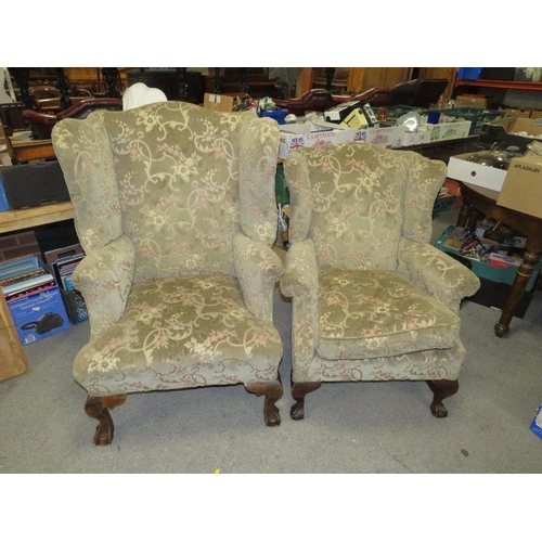 737 - TWO VINTAGE UPHOLSTERED WINGBACK ARMCHAIRS