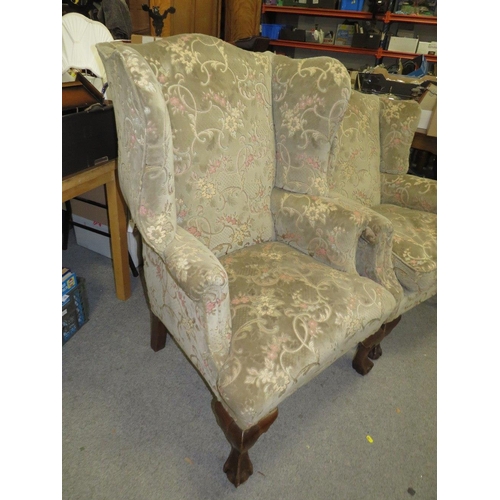 737 - TWO VINTAGE UPHOLSTERED WINGBACK ARMCHAIRS