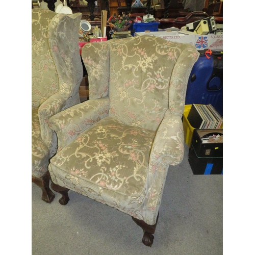 737 - TWO VINTAGE UPHOLSTERED WINGBACK ARMCHAIRS