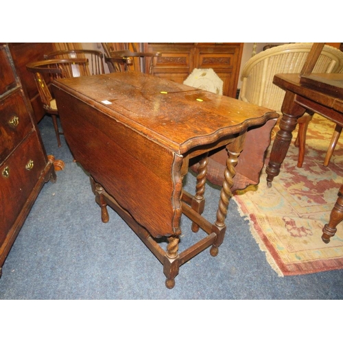 746 - AN OAK BARLEYTWIST GATELEG TABLE