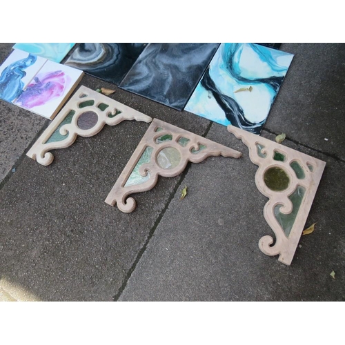 761 - THREE GOTHIC STYLE BRACKETS WITH A QUANTITY OF PAINTED PANELS