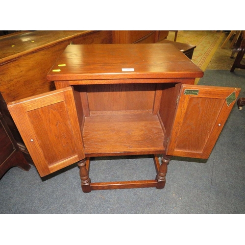 764 - AN 'OLD CHARM' TWO DRAWER LINENFOLD CUPBOARD H-71 W-50 CM