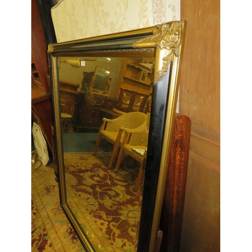 778 - A LARGE MODERN BLACK AND GILT RECTANGULAR WALL MIRROR 138 X 106 CM