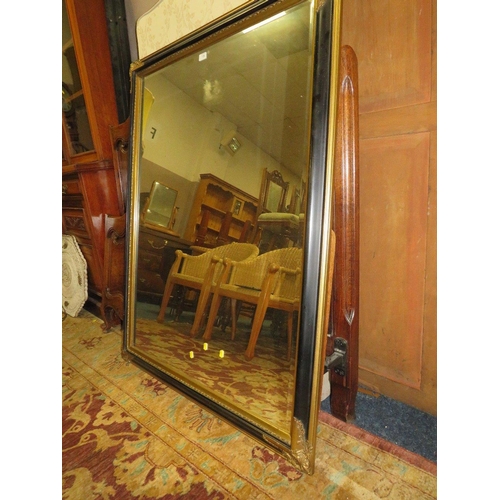 778 - A LARGE MODERN BLACK AND GILT RECTANGULAR WALL MIRROR 138 X 106 CM