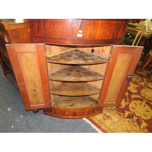 782 - AN ANTIQUE MAHOGANY BOW FRONTED HANGING CORNER CUPBOARD W-89 CM