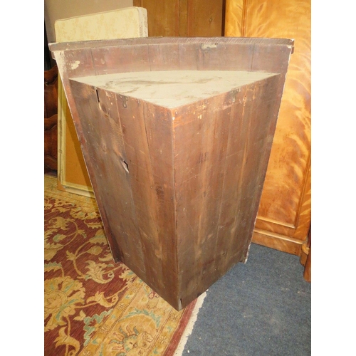 782 - AN ANTIQUE MAHOGANY BOW FRONTED HANGING CORNER CUPBOARD W-89 CM