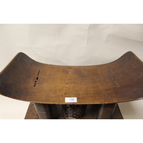 116 - A GHANAIAN ASHANTI HARDWOOD STOOL, with later added feet, overall H 55 cm, without feet H 33.5 cm