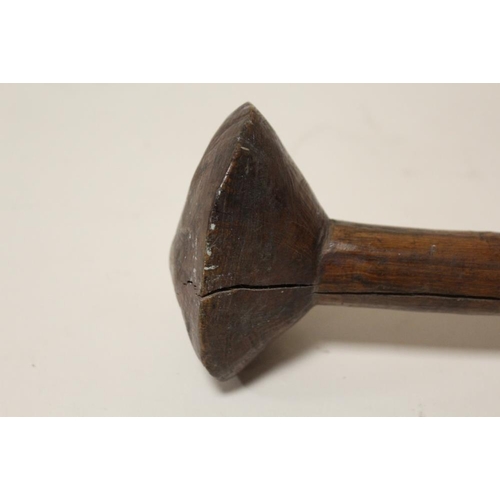 118 - A VINTAGE AUSTRALIAN ABORIGINAL THROWING CLUB, having a conical head and pointed tip, L 57 cm