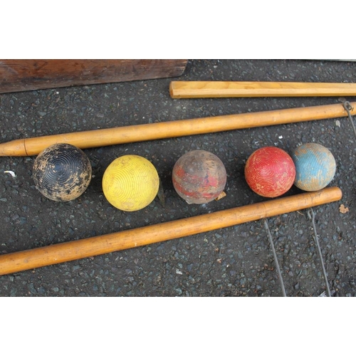 129 - A VINTAGE PINE CASED JACQUES OF LONDON PART CROQUET SET, together with a vintage Slazenger 'Thors Cr... 