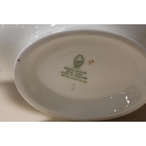 91 - A LARGE QUANTITY OF WEDGWOOD BEACONSFIELD CHINA, to include dinner plates, tureens, meat plates, cof... 