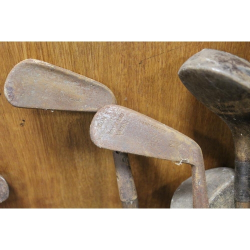 94 - A LARGE QUANTITY OF VINTAGE WOODEN HANDLED GOLF CLUBS, some marked C H Clay, together with a quantit... 