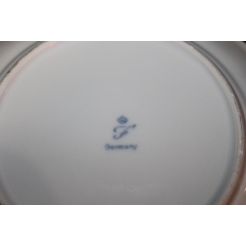 98 - A TRAY OF VINTAGE GERMAN FLORAL CHINA TO INCLUDE A TEAPOT