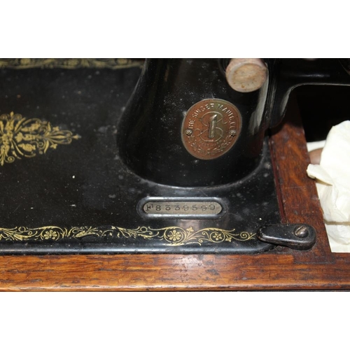 151 - A CASED SINGER SEWING MACHINE - F8339599
