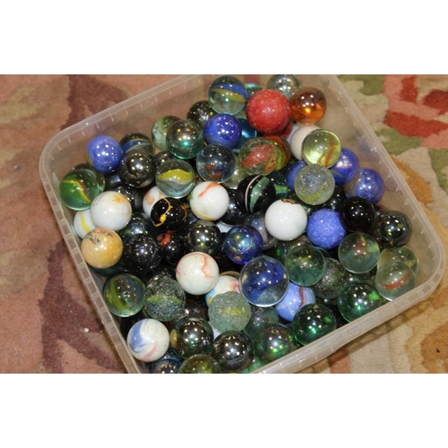 123 - TWO TRAYS OF ASSORTED COLLECTABLES TO INCLUDE A VINTAGE TELEPHONE, MARBLES, ICE SKATES (PLASTIC TRAY... 