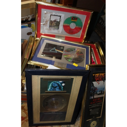 36 - A LARGE QUANTITY OF MOSTLY FRAMED AND GLAZED MUSIC INTEREST CD AND VINYL RECORD DISPLAYS MOUNTED WIT... 