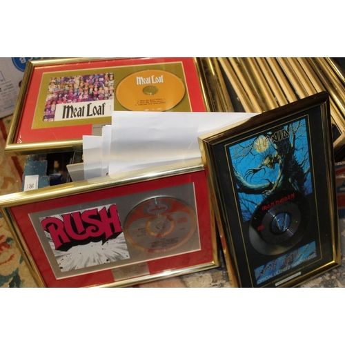 36 - A LARGE QUANTITY OF MOSTLY FRAMED AND GLAZED MUSIC INTEREST CD AND VINYL RECORD DISPLAYS MOUNTED WIT... 