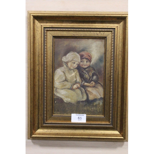 65 - A GILT FRAMED ANTIQUE OIL ON BOARD DEPICTING SEATED CHILDREN NOTE - SCRATCHES TO CENTRE PICTURE SIZE... 