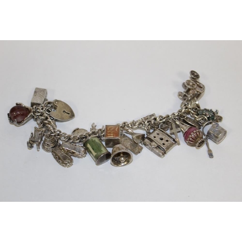 368 - A HEAVY SILVER VINTAGE CHARM BRACELET, APPROX WEIGHT 114 G