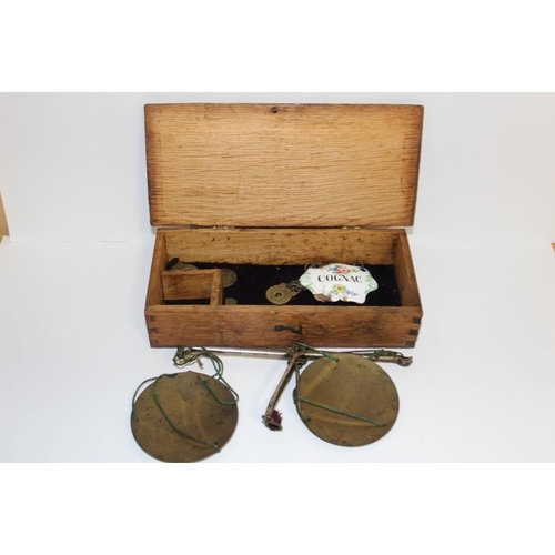 373 - A SET OF ANTIQUE SCALES AND WEIGHTS, WINE LABEL, AND MINIATURE PADLOCK