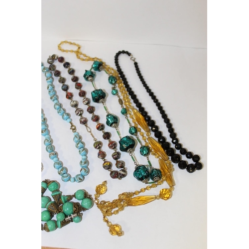 382 - EIGHT VINTAGE GLASS NECKLACES TO INCLUDE A MURANO STYLE EXAMPLE