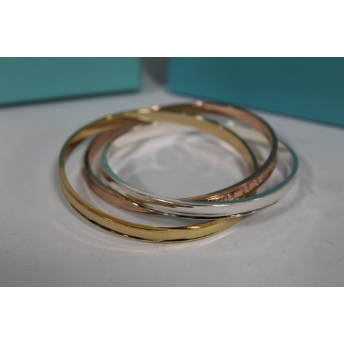 393 - A REPRODUCTION TIFFANY STYLE TRIPLE BANGLE WITH BOX AND BAG