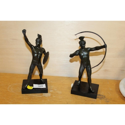 309 - THREE BRONZE EFFECT WARRIOR FIGURES ON PLINTHS - WITH DAMAGES