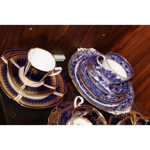 335 - A COLLECTION OF TRIOS AND OTHER CUPS AND SAUCERS TO INCLUDE ROYAL CROWN DERBY 1128 CUP AND SAUCER, A... 