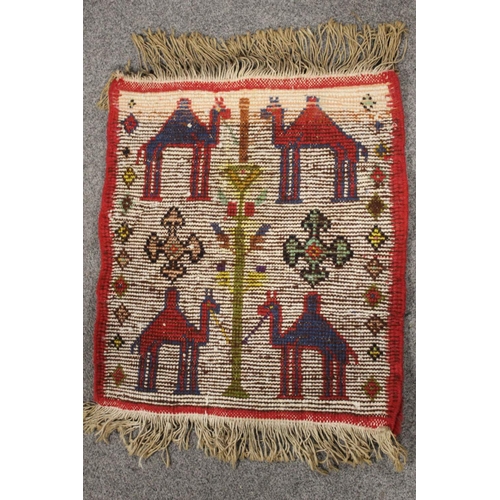 315A - AN EASTERN WOOLLEN PRAYER MAT