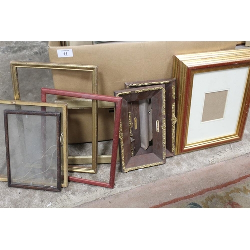 11 - A BOX OF VINTAGE PICTURE FRAMES AND PRINTS ETC.