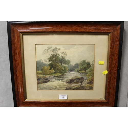 42 - A FRAMED AND GLAZED WATERCOLOUR OF A COUNTRY RIVER SCENE SIGNED JAMES HERON LOWER RIGHT - 21 X 26 CM