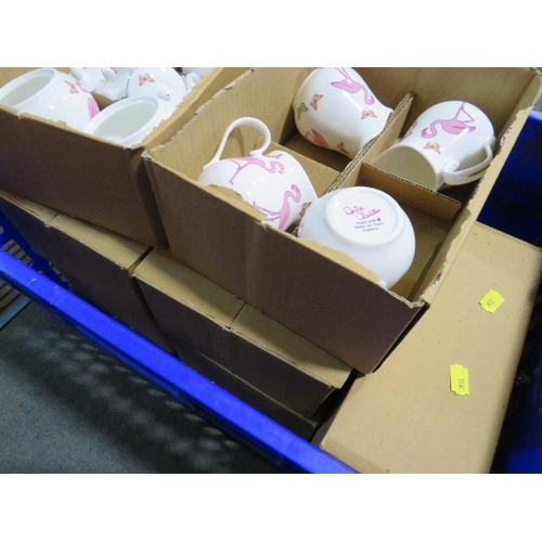 101 - A QUANTITY OF BOXED DENISE O'SULLIVAN CERAMIC FLAMINGO PATTERN JUGS AND SUGAR BOWLS