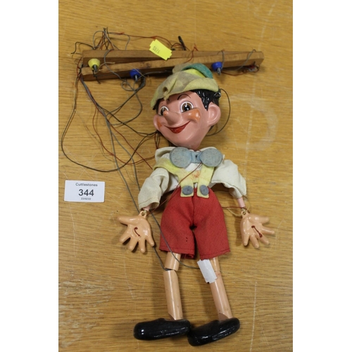 344 - A VINTAGE WOODEN PINOCCHIO PUPPET