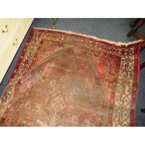 841 - A PERSIAN WOOLLEN RUNNER / CARPET, MAINLY RED AND BLACK GROUND - FADED -  282 X 131 CM