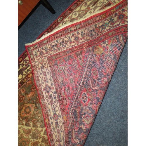 841 - A PERSIAN WOOLLEN RUNNER / CARPET, MAINLY RED AND BLACK GROUND - FADED -  282 X 131 CM