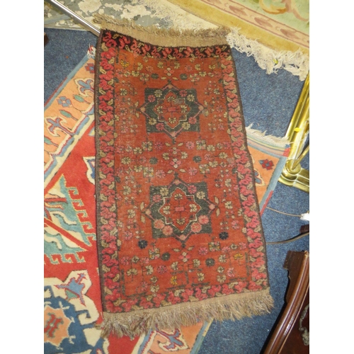 842 - TWO SMALL EASTERN WOOLLEN CARPETS, LARGEST 128 X 86 CM (2)