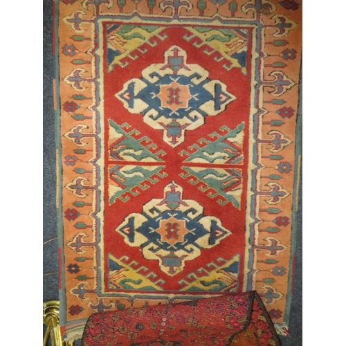 842 - TWO SMALL EASTERN WOOLLEN CARPETS, LARGEST 128 X 86 CM (2)